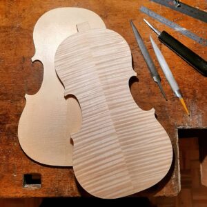 Top and back of a violin: edge work, by Milos Seyda