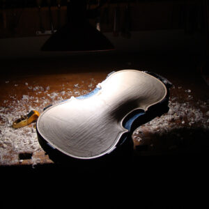 Giving the shape to the archings of a violin, by Milos Seyda